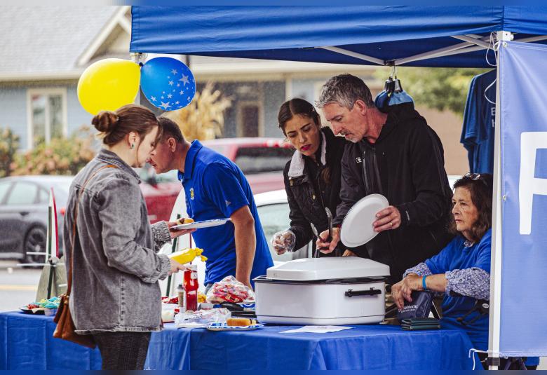 Wabasha rotary members serve warm food at their 75 year anniversary celebration on Saturday.   Photos by Sophie Horgan